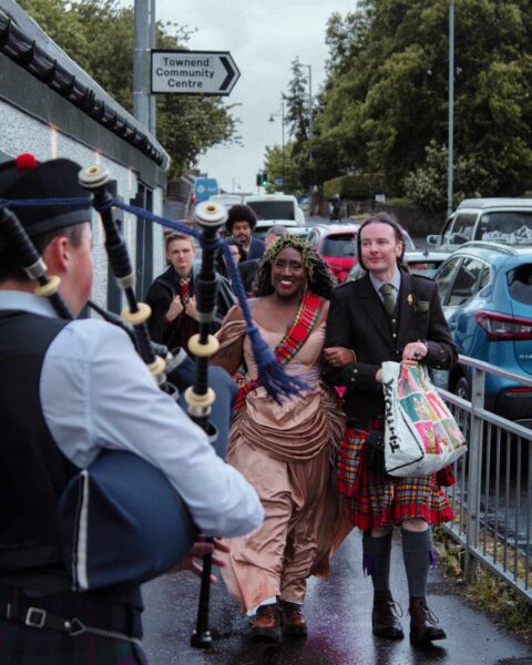 The Happy Day, Kellyn and I on the way into our wedding reception. (Tartan is clan Chattan)